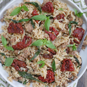 instant pot ground lamb pilaf with sun-dried tomatoes and basil